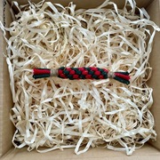 Cukierek zawieszka świąteczna makrama czerwono - zielona ozdoba