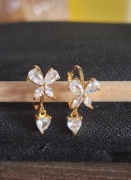 Kolczyki koła z motywem motyla i zawieszką w kształcie serca srebro s925