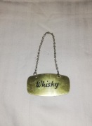 Metalowa zawieszka na alkohol