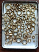 Łożyska / wężydła mosiężne do naprawy zegarów. Nowe. 100 sztuk. Mix 