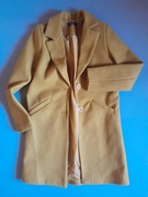 Żółty płaszczyk jesienny.