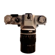 Aparat analogowy Nikkormat EL + obiektyw Nikkor 135mm f2.8