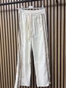 Białe spodnie damskie pas 80/90 paski