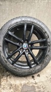 Oryginalne aluminiowe felgi BMW (wzór V-spoke) na oponach zimowych Fulda