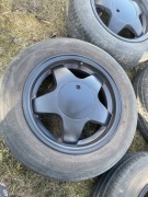 Koła alufelgi felgi czarne 14 4x100 z dekielkami opony letnie Toyo 175/65 