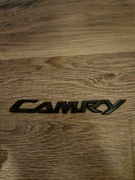 EMBLEMAT ZNACZEK CZARNY TOYOTA CAMRY 2006-2011 TYLNA KLAPA NAPIS CAMRY