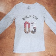 Bluzka dziewczęca magiczne cekiny r.134/140