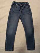 Niebieskie regulowane bawełniane spodnie jeansowe jeansy H&M 140