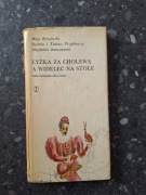 łyżka za cholewą a widelec na stole Berezowska