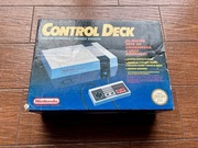 Nintendo NES NESE-001, kompletny, 2 pady + gra. Bardzo ładny stan