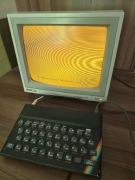 ZX Spectrum z zasilaczem, interfejsem i 2 ksiazkami