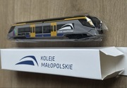Koleje Małopolskie KMŁ Pendrive w kształcie pociągu Newag Impuls nowy kolej