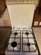 Kuchenka gazowa firmy AMICA biała, czysta, sprawna / mało używana