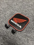 Wieszak na klucze, ubrania motocyklowe Honda