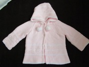 ANPOL Sweterek różowy kaptur pompony 86