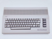 Komputer Commodore C64C, green led