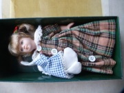 Lalka porcelanowa z pajacykiem ok. 17 cm