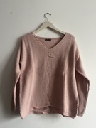 Różowy sweterek z dekoltem w V