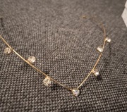 Złota ozdoba na włosy z kryształkami 