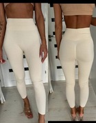 Sexy legginsy beżowe kremowe prążek podkreślające pupę  XS pasuje też na S