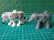 Lego DUPLO figurki zwierzątek: zebra i mały słoń  - zestaw 2 szt.