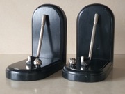 "Kije i piłki golfowe", podpórki do książek 