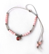 Bransoletka damska masa perłowa perły róż srebrne dodatki stal chirurgiczna