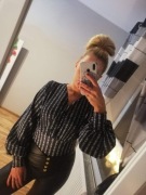 Seksowne czarne body z poszerzanym  rękawami.