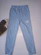 Chłopięce spodnie dresowe r 128 Sinsay