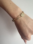 złota bransoletka Christia n Dio r z ozdobnym sercem wysadzanym