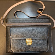 Vintage skórzana torba fotograficzna na aparat i obiektywy