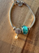 Srebrna bransoletka z charmsami Apart