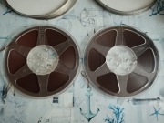 Dwie taśmy szpulowe PYRAL na szpulach plastikowych 25 cm w opakow. metal.