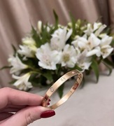 Złota (585) bransoletka 27,6g , z diamentami 