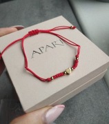 Bransoletka nowa na sznurku serce złote pleciona na rękę regulowana