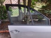 Szyba przednich prawych drzwi Scenic II