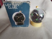 Unikatowy budzik lottery clock w pudełku.