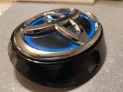 Znaczek, logo, na klapę tył z miejscem na kamerę Toyota Corolla  E21