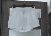 Szorty jeansowe damskie krótkie spodenki strzępione nogawki r. L 40 