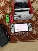 Nintendo switch OLED zestaw (dodatkowe joycony, 5gier, etui)