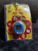 Retro Hit: Tamagotchi 8-w-1 "Pets Park" (1997) – Niebieski