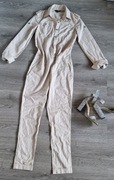 Kremowy kombinezon