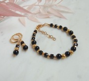 Komplet bransoletka i kolczyki spinel, onyks i złota lawa