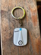Oryginalny, biały brelok do kluczy Vespa