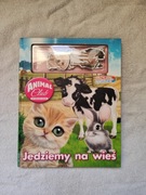 Książka dla dzieci "Jedziemy na wieś" z magnesami.