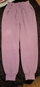 Spodnie dresowe fioletowe 140