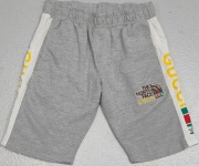 S) GUCCI THE NORTH FACE SPODENKI Roz.128cm