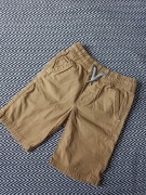 Krótkie spodenki Next rozmiar 116