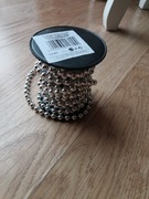 Łańcuch z koralami na szpuli 