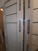 Drzwi łazienkowe 70 lewe białe marki Windoor 